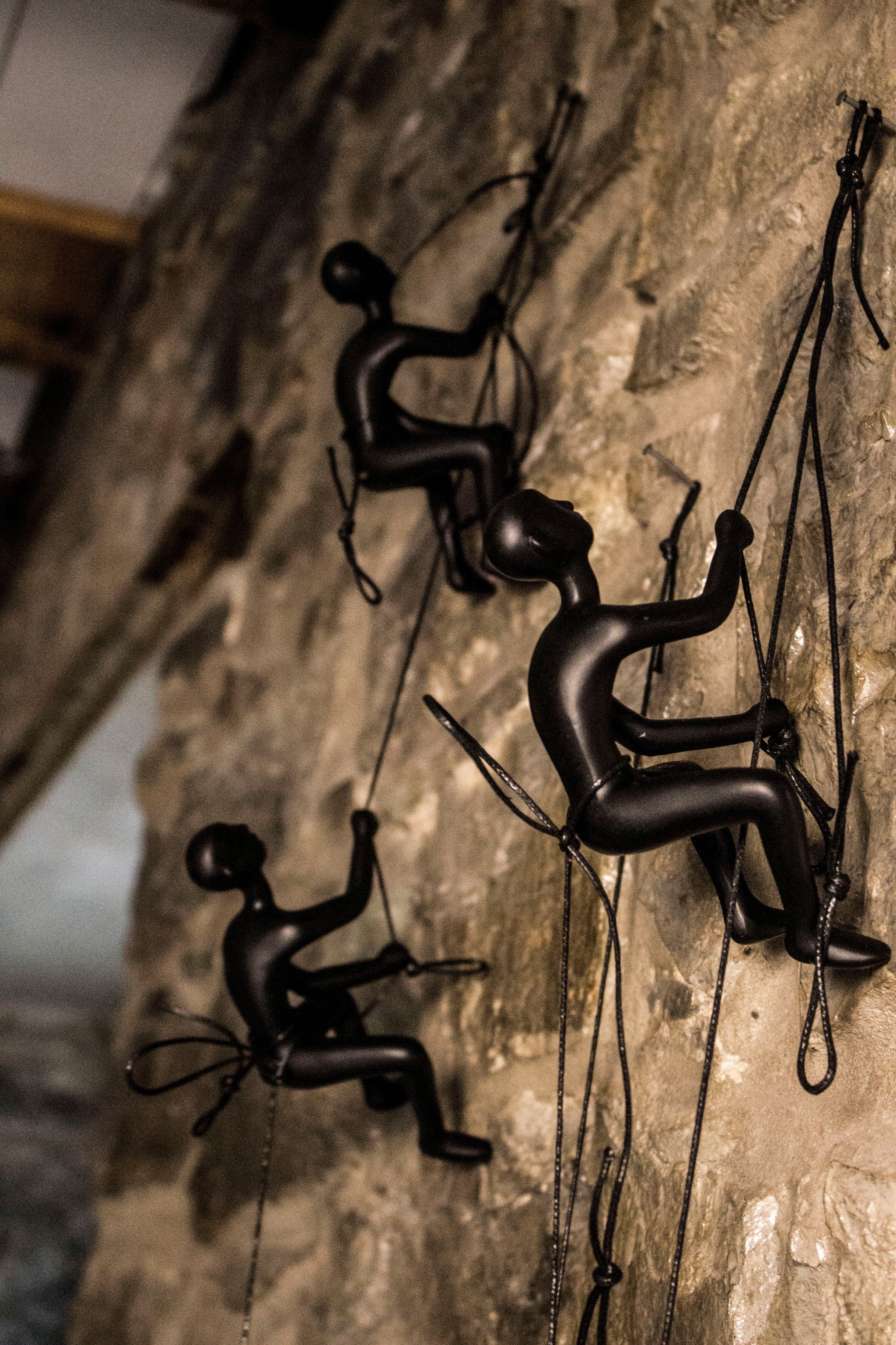 Set of Three Black Resin Climbing Man Hanging Dimensional Sculpture
