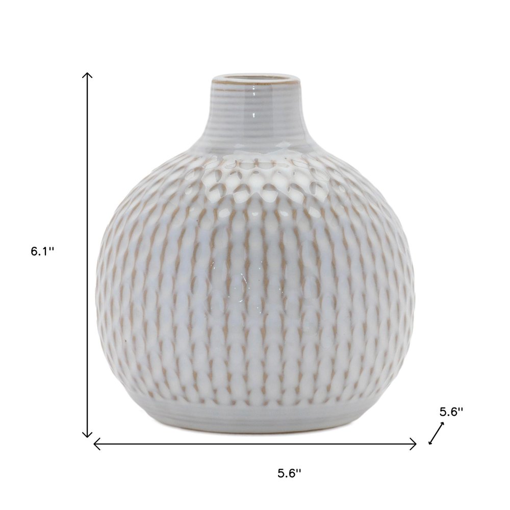 Set of Four Natural And Off White Ceramic Bud Vases With Sculptural Details
