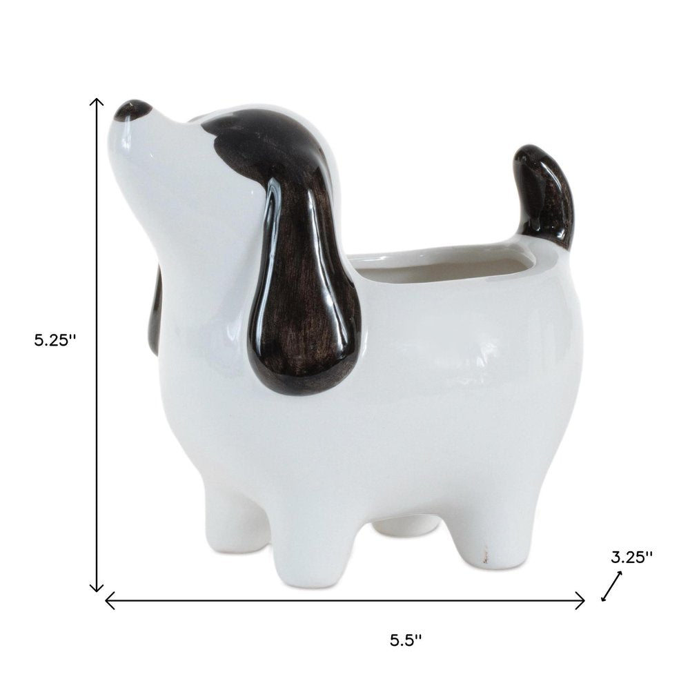Set of Four Black And White Polyresin Dog Planters
