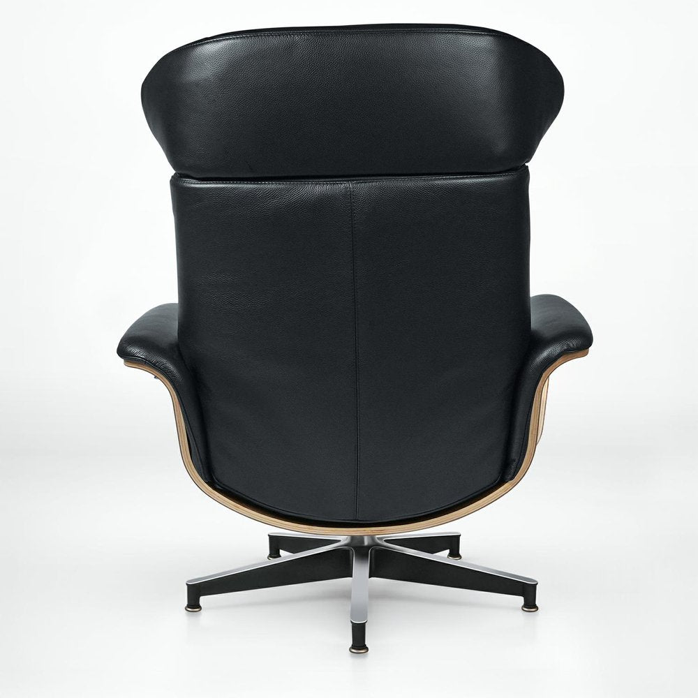 33" Black and Walnut Leather And Wood Swivel Lounge Chair With Ottoman
