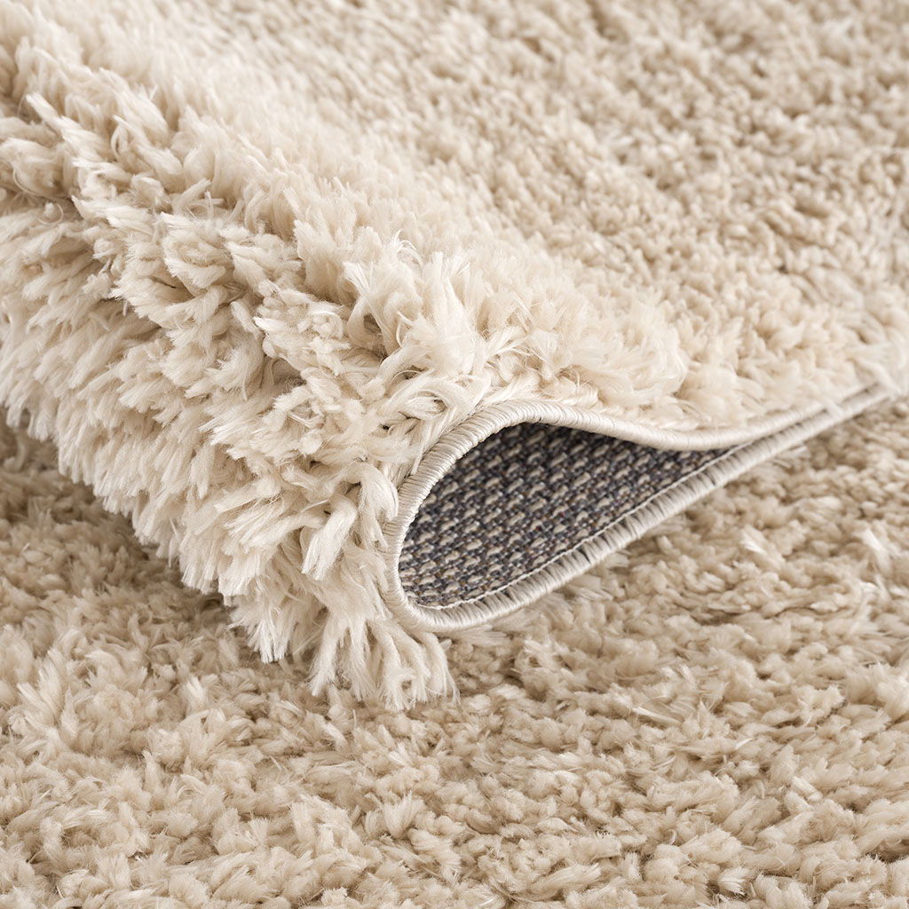 Camdyn - 7' X 9' Shag Area Rug - Cream