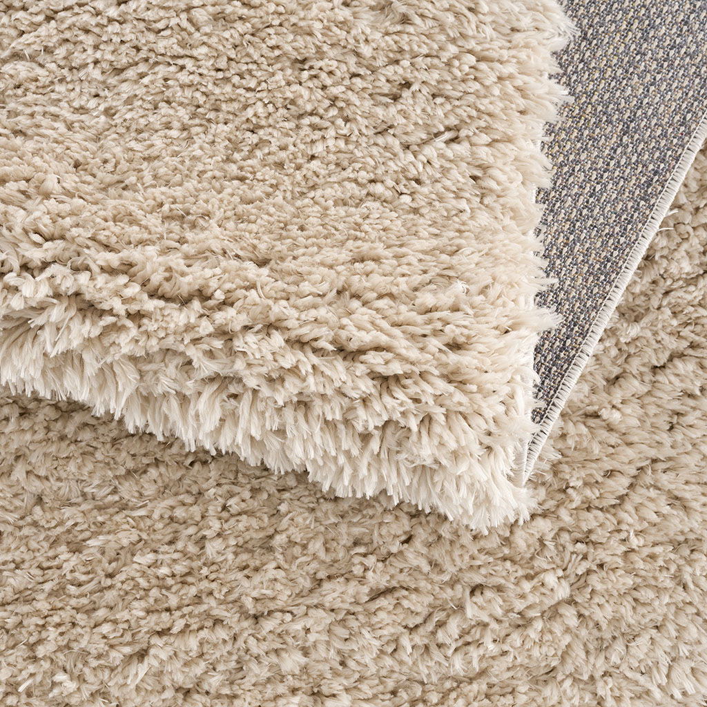 Camdyn - 7' X 9' Shag Area Rug - Cream